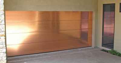 Copper garage door restored with Everbrite Coating
